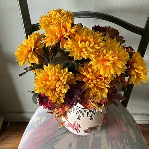 Yellow, brown and reddish flowers with base